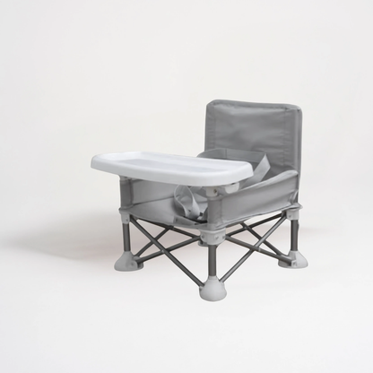 Siège d'appoint portable de couleur noire pour bébé, pliant, avec plateau de repas amovible blanc sur fond clair